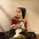 Illustration for article titled Fathers Stunning Portraits of His Daughter Look Like Classic Paintings by the Masters